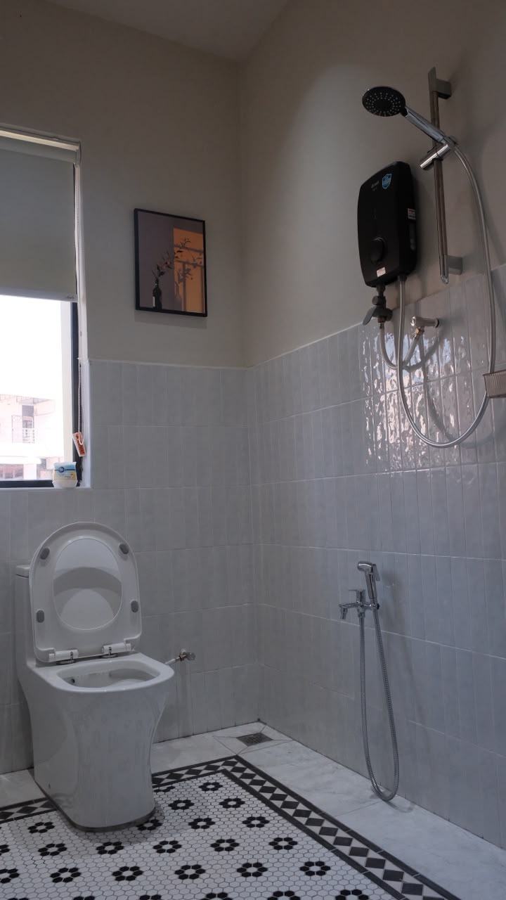 Bathroom with patterned floor tiles