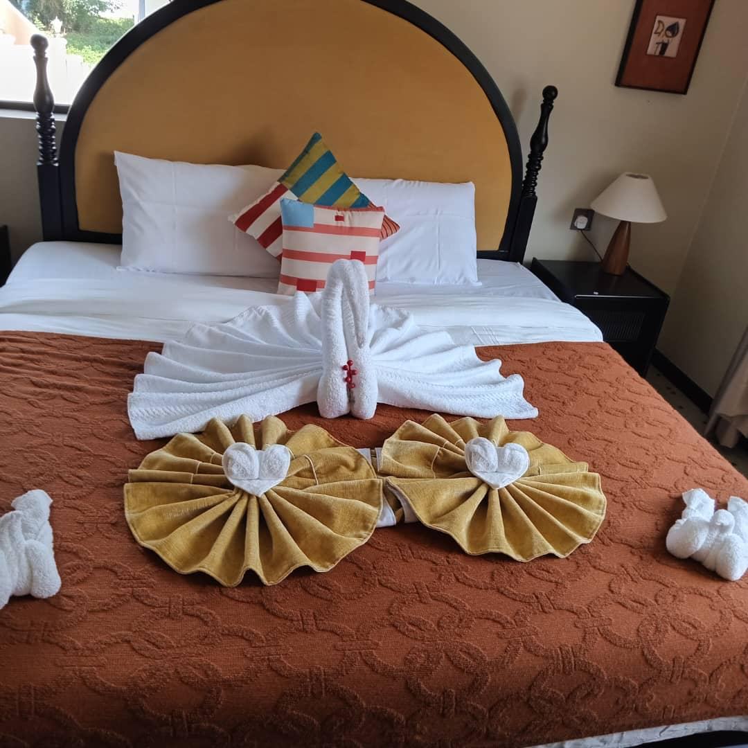 Bed with towel swans